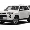 A white Toyota 4 Runner